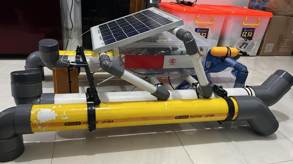 Side view of SPAT boat showing solar panel and pontoons